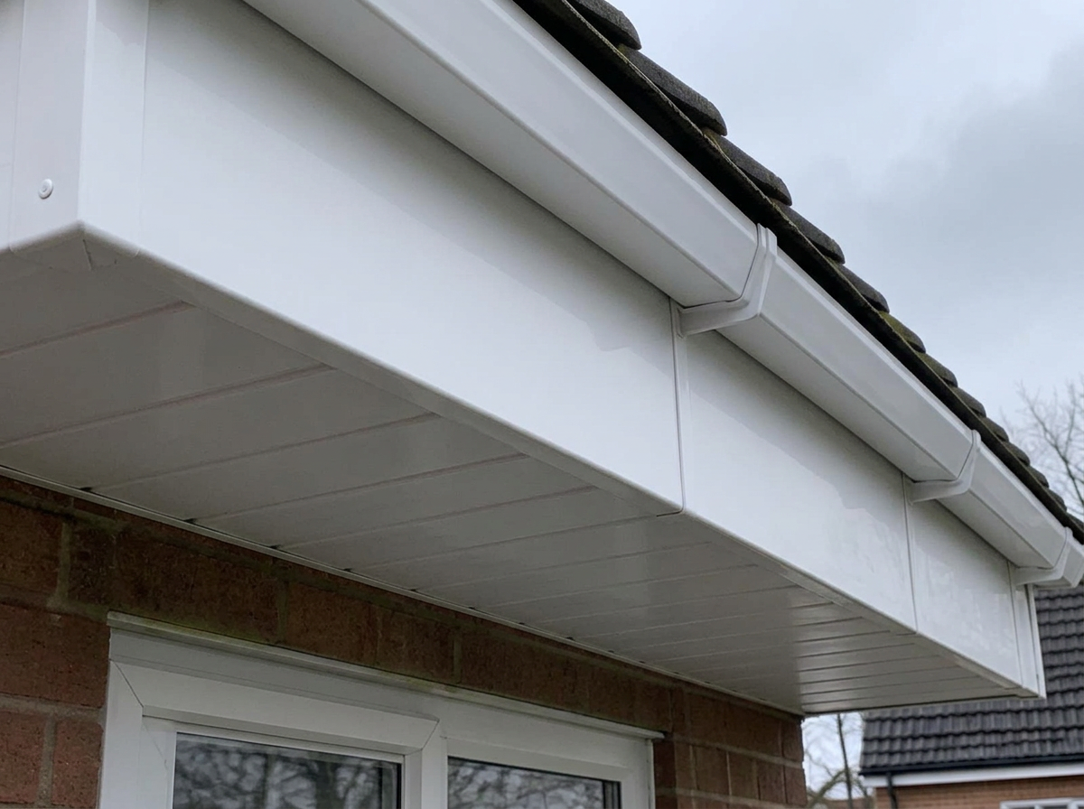 After: The same boards and soffits cleaned back to bright white.